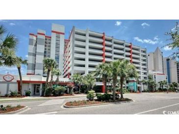 A beautiful exterior shot of the resort, highlighting the well-maintained facade and tropical landscaping at 7200 N Ocean Blvd. # 436, Myrtle Beach, SC 29572