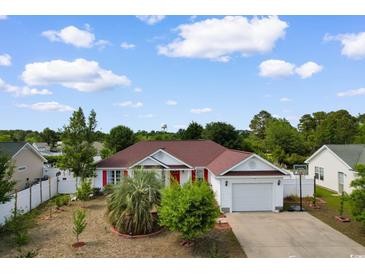 Charming single story home with a well maintained lawn and attached garage at 761 Drawbridge Dr., Conway, SC 29526