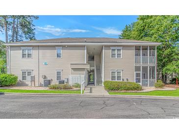 Condominium building with stairs and screened-in porches at 2312 Sweetwater Blvd. # 2312, Murrells Inlet, SC 29576