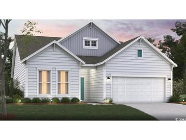Charming single-story home with a symmetrical facade, attached garage, and well-manicured lawn at 4008 Braid Ct., Myrtle Beach, SC 29588
