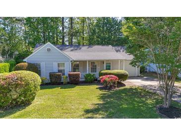 Charming single-story home with a manicured lawn and mature landscaping at 88 Purple Martin Dr., Murrells Inlet, SC 29576