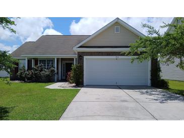 Charming single-story home featuring a two-car garage and well-maintained lawn in a peaceful neighborhood at 843 Brookline Dr., Myrtle Beach, SC 29579