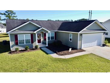 Charming single Gathering home with two-car garage, manicured lawn and attractive landscaping at 1220 Alcazar Ct., Conway, SC 29527