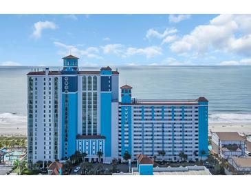 Beautiful beachfront condo with blue accents, multiple balconies, and stunning ocean views at 3000 N Ocean Blvd. # 220, Myrtle Beach, SC 29577