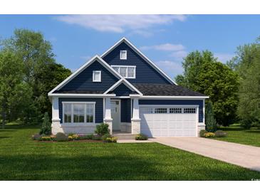 Charming two-story home with a blue exterior, white trim, and a well-manicured lawn on a sunny day at 7075 Denim Loop, Myrtle Beach, SC 29579