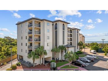 Stunning condo building featuring balconies and lush landscaping in a desirable location at 200 Lands End Blvd. # 3015, Myrtle Beach, SC 29572