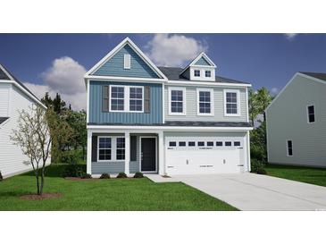 Charming two-story home with a light blue facade, attached garage, and well-manicured lawn at 1113 Hainer Place Dr, Conway, SC 29526