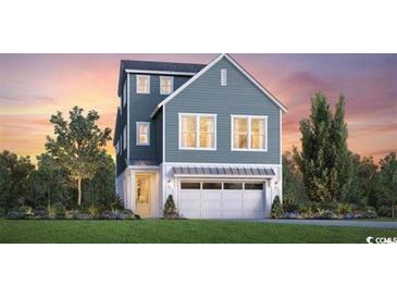 Charming two-story home boasts a two-car garage and neatly manicured lawn at 512 9Th Ave. S, North Myrtle Beach, SC 29582