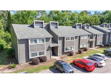 Beautiful multi-Gathering exterior with neat landscaping and ample parking in a desirable neighborhood at 10301 N Kings Hwy. # 10-4, Myrtle Beach, SC 29572