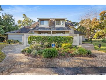 Charming two-story condo with well-manicured landscaping and private entrance at 306 Westbury Ct. # 2-B, Myrtle Beach, SC 29572