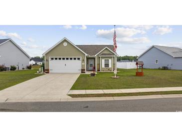 Charming home featuring an attached garage and a well-manicured lawn at 362 Shallow Cove Dr., Conway, SC 29527