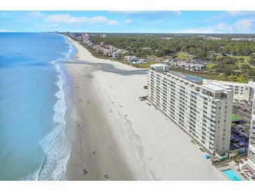 Expansive aerial view of condo complex with beach access and oceanfront views at 9400 Shore Dr. # 523, Myrtle Beach, SC 29572