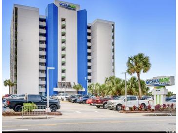 Ocean Park Resort exterior featuring the building, landscaping and parking lot at 1905 S Ocean Blvd. # 922-924, Myrtle Beach, SC 29577
