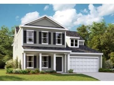 Charming two-story home featuring gray siding, black shutters, well-manicured lawn, and an attached two-car garage at 3068 Palma Way, Myrtle Beach, SC 29579