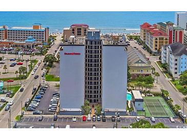 Holiday Towers exterior showcasing its prime oceanfront location and nearby amenities at 601 Mitchell Dr. # 806, Myrtle Beach, SC 29577
