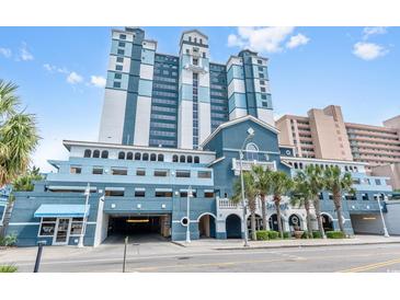 Beautiful exterior view of a modern building with a parking garage and palm trees in front at 2201 South Ocean Blvd. # 1808, Myrtle Beach, SC 29577