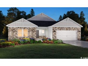 Charming two-story home with stone accents, manicured lawn, and inviting curb appeal at 4857 Hopespring St., Myrtle Beach, SC 29579