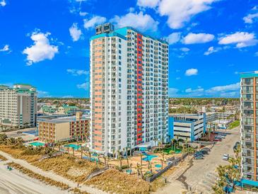 Colorful high-rise condo building featuring beach access, pools, and parking at 1605 S Ocean Blvd. # 1909, Myrtle Beach, SC 29577