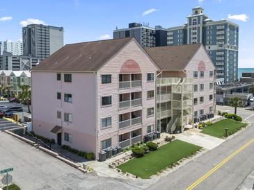 Aerial view of a multi-story condominium complex at 2710 South Ocean Blvd. # 208, Myrtle Beach, SC 29577