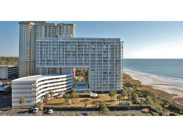Stunning oceanfront condo building with a pool, beach access, and ample parking at 9840 Queensway Blvd. # 329, Myrtle Beach, SC 29572