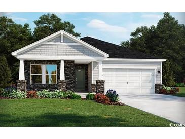 Charming single-story home featuring stone accents, a two-car garage, and a beautifully landscaped front yard at 1584 Regal Fern Way, Longs, SC 29568