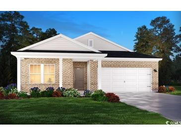 Charming single-story brick home featuring a two-car garage, covered front porch, and well-maintained landscaping at 4365 Falls Oaks St., Myrtle Beach, SC 29579
