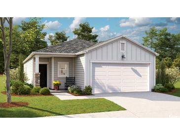 Charming single-story home featuring a two-car garage, well-maintained lawn, and welcoming front porch at 1171 Silver Perch Place, Sunset Beach, NC 28468