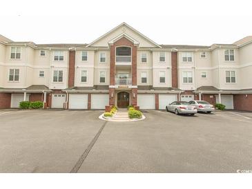 Spacious condo with attached garage and ample parking space for residents and guests at 2241 Waterview Dr. # 315, North Myrtle Beach, SC 29582