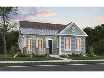 Charming single-story home with a covered front porch and landscaped yard at 812 Maltby Alley, Myrtle Beach, SC 29588
