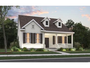 Charming one-story home featuring a welcoming front porch and meticulously landscaped front yard at 905 Monmouth Dr., Myrtle Beach, SC 29588