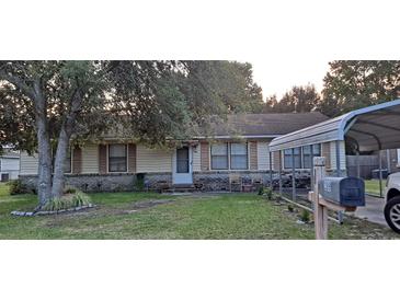 Charming single story home with a well-maintained front yard and covered parking at 289 Whites Creek Rd., Georgetown, SC 29440