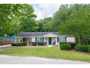Charming single-story home with well-maintained lawn and inviting landscaping at 2510 Redwood St., Georgetown, SC 29440