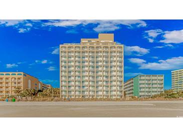 Beautiful exterior view of a beachfront hotel with multiple floors and private balconies at 1207 Ocean Blvd. S # 20802, Myrtle Beach, SC 29577