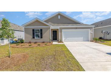 Charming single-story home with a well-manicured lawn and attached one car garage at 132 Dagger Ct., Myrtle Beach, SC 29588