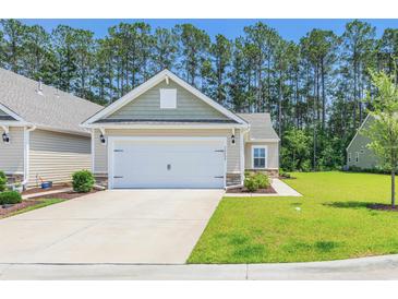 Charming single-Gathering home featuring an attached garage and well-manicured lawn in a desirable neighborhood at 2020 Willow Run Dr. # D, Little River, SC 29566