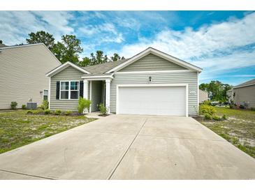 Charming single-story home with a two-car garage and well-maintained front yard at 2315 Blackthorn Dr., Conway, SC 29526