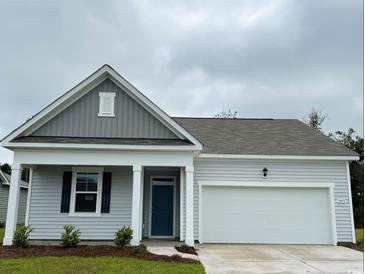 Charming single-story home with a two-car garage, and a welcoming front entrance at 3599 Ashridge Way, Conway, SC 29526