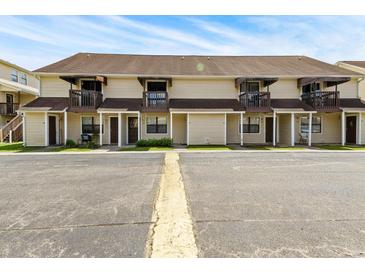 Straight-on view of a two-story townhouse with balconies at 755 Burcale Rd. # E-3, Myrtle Beach, SC 29579