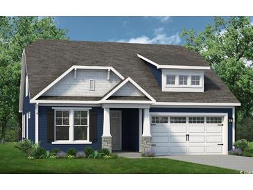 Charming single-Gathering home with a two-car garage, well-manicured lawn, and stylish blue siding at 831 Big Cedar Dr., Loris, SC 29569