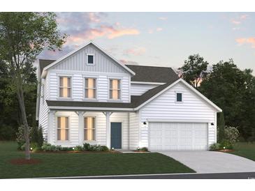 Charming two-story home with white siding, a covered porch, attached garage, and a beautifully landscaped yard at 4023 Braid Ct., Myrtle Beach, SC 29588