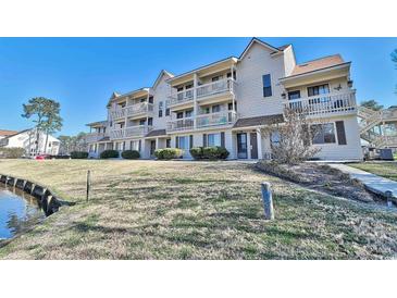 Inviting condo complex boasting multiple balconies overlooking lush grounds and waterway access at 510 Fairwood Lakes Dr. # 18N, Myrtle Beach, SC 29577