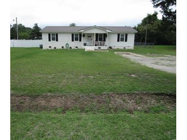Charming single story home featuring a well-manicured lawn at 5578 Dongola Hwy., Conway, SC 29527