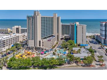 Gorgeous aerial view of the resort, showcasing the waterpark and nearby beach at 201 74Th Ave. N # 2243/2244, Myrtle Beach, SC 29572