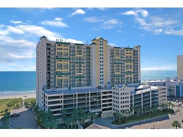 Spacious oceanfront condo building with beach access and multi-level parking garage at 201 S Ocean Blvd. # 1106, North Myrtle Beach, SC 29582