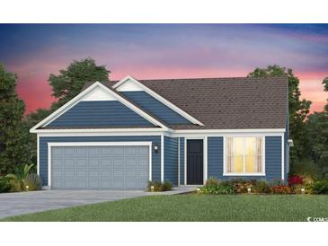 Charming one-story home featuring blue siding, a gray garage door, and well-manicured landscaping at 295 River Edge Dr., Myrtle Beach, SC 29588