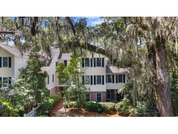 Charming home with black shutters, brick accents, and lush green landscaping at 1969 Governors Landing Rd. # 224, Murrells Inlet, SC 29576