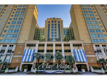 Mar Vista Grande building exterior showing well-maintained landscaping and architectural details at 603 S Ocean Blvd. # 1205, North Myrtle Beach, SC 29582