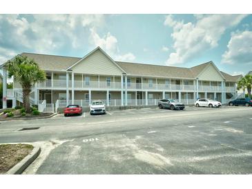 Inviting condo exterior features balconies and ample parking, ideal for easy living at 109 Butkus Dr. # 2-1, Myrtle Beach, SC 29588