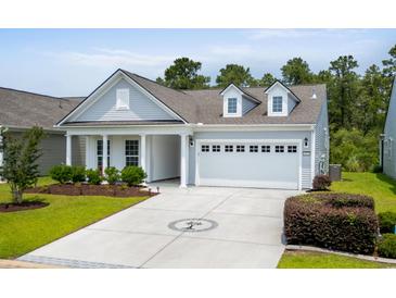 Charming single-Gathering home featuring a well-manicured lawn and a two-car garage at 4555 Weekly Dr, Myrtle Beach, SC 29579
