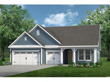 Charming single-Gathering home with a two-car garage, lovely landscaping, and inviting entry at 755 St. Vincent Loop, Little River, SC 29566